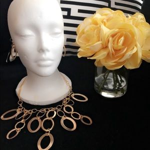 Gold plated necklace with earrings.